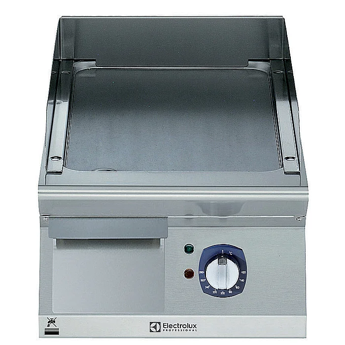 Gamma cottura modulare<br>Fry top elettrico con piastra liscia e inclinata, in acciaio al cromo spazzolato